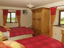 Foxhill Barn has four comfortable and attractively furnished twin bedrooms capable of providing accommodation for up to eight people.